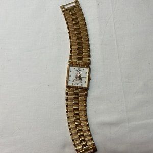 Jesus Christ, gold tone, “bling “watch